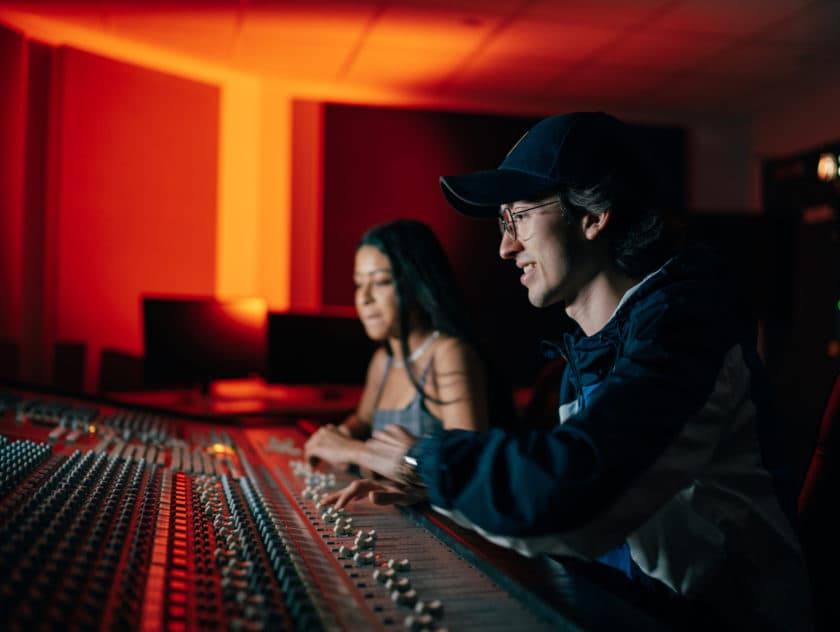 Students at Mixing Desk SAE