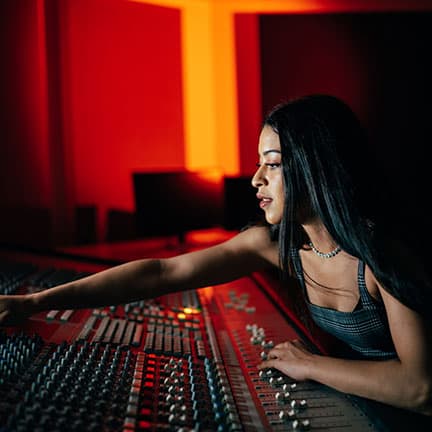 Student at SAE Mixing Desk